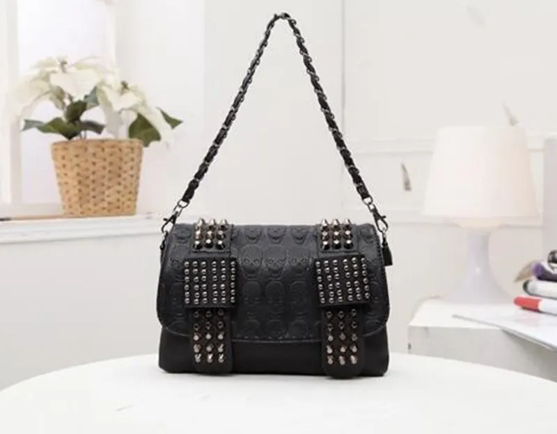 Black Leather Messenger Bag with Skull Rivets