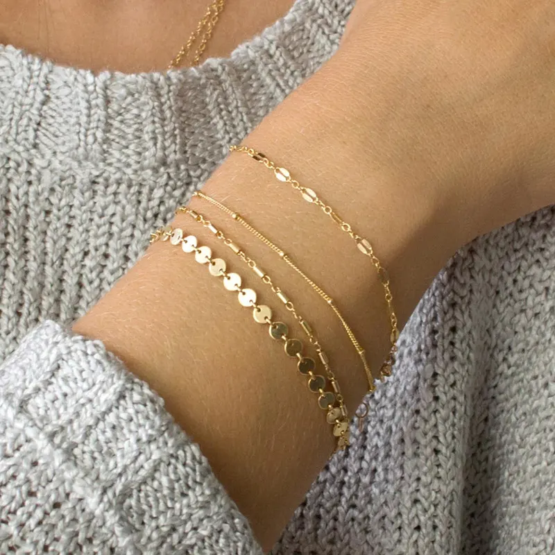 Four-Piece Gold and Silver Chain Bracelet Set