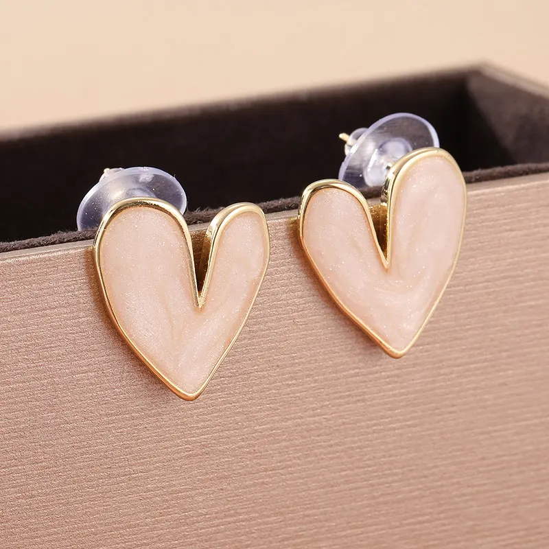 Asymmetric Blush Heart Stud Earrings
